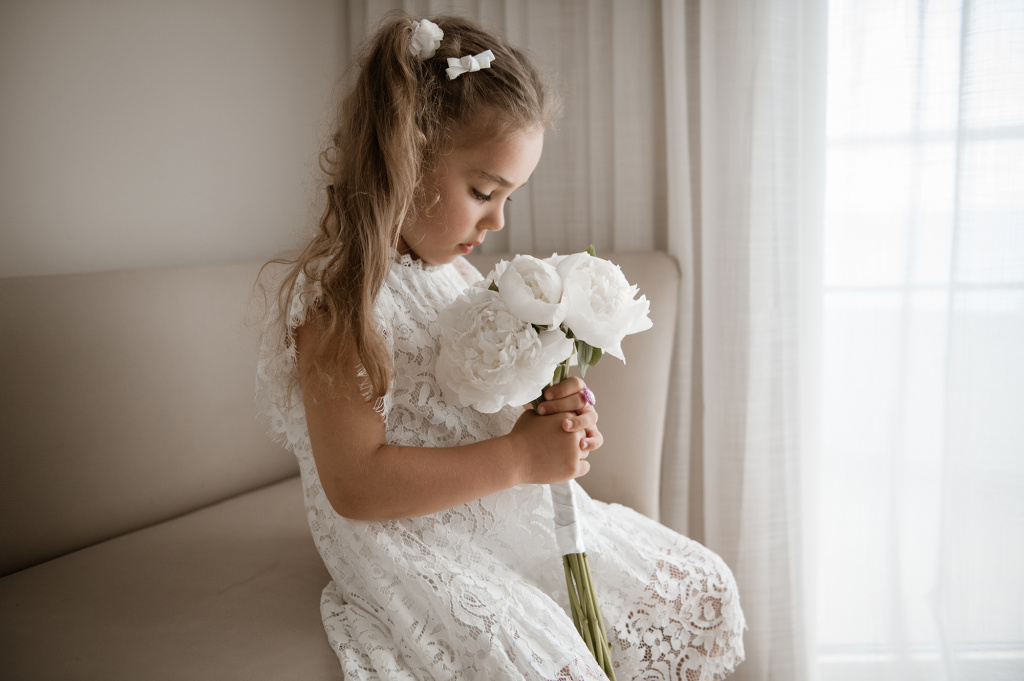 Little girl with wedding bouqet