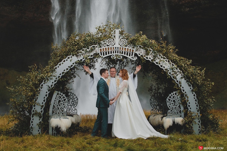 Destination elopement in Iceland, seljalandsfoss waterfall 