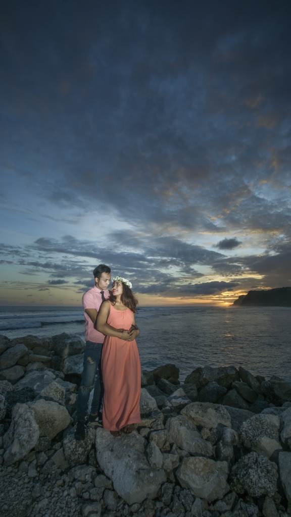 Romantic moment with sunset at Melasti Beach