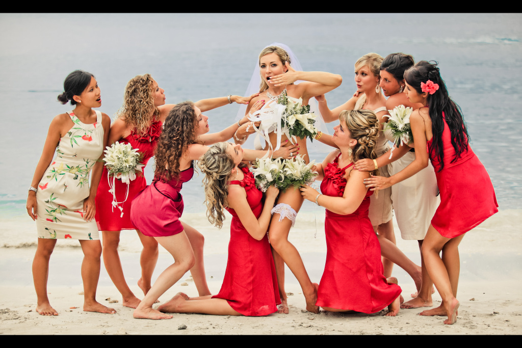 A beautiful bride and her caring friends, on the Caribbean coast.
